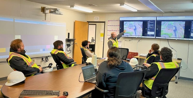 PC Construction team gathers for a planning meeting.